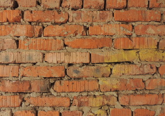 Old red weathered rough  brick wall texture loft style.