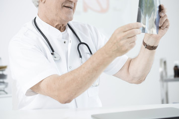 Doctor looking at x-ray