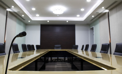 Microphone and modern table boardroom with chair black. luxurious meeting room in a big corporation