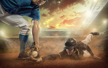 Baseball players in action on the stadium. © Andrii IURLOV