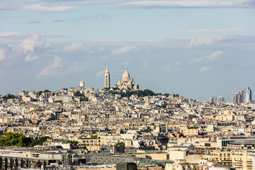 Aerial view of Paris cityscape with Basilique du Sacre Coeur on Montmartre hill. Paris, France
