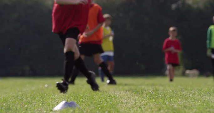 Group of boys training before their soccer match. Shot on RED Epic.