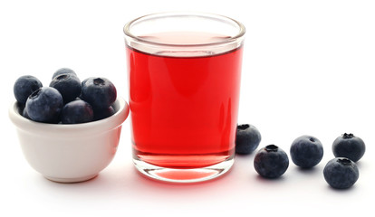 Group of fresh blueberries with juice