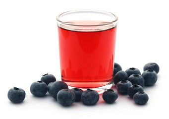 Fototapeta na wymiar Group of fresh blueberries with juice