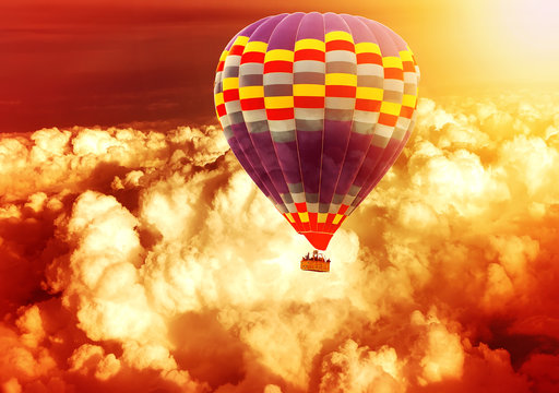 Hot air balloon flying over Clouds in a Sky fluffy texture