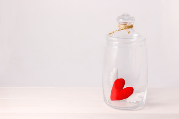 felt heart closed in glass jar