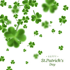 St. Patrick's Day background. Clover leaves with blur effect for greeting holiday design. Vector illustration.