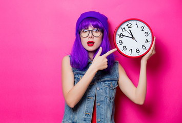 hipster girl with purple hair and big clock
