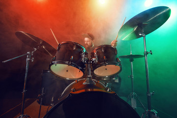 Obraz na płótnie Canvas The drummer plays solo. Rock concert.