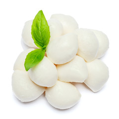 Traditional Italian Mozzarella cheese and basil on white background