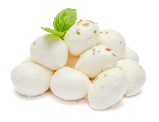 Traditional Italian Mozzarella cheese and basil on white background