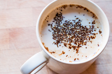 Instant Granulated Coffee Powder with Milk in Cup