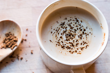 Instant Granulated Coffee Powder with Milk in Cup