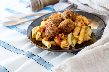 tasty penne with Meat ball and tomato sauce