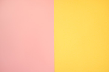 Pink salmon and yellow color paper, abstract background