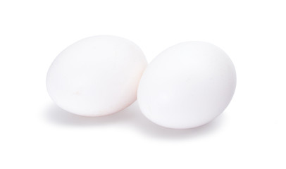 Group of two white eggs isolated on white background