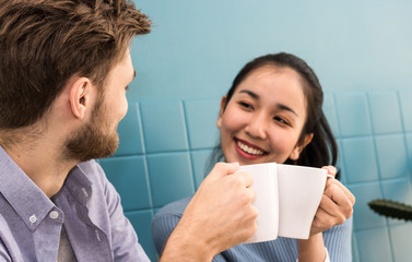 man and women drinking coffee in the morning in home