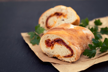 bread with smoked sausage on plate