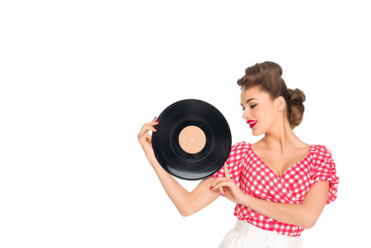 Portrait Of Woman In Pin Up Style Clothing Holding Vinyl Record In Hands Isolated On White