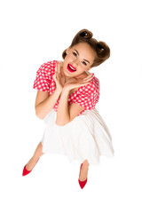 overhead view of attractive young woman in retro clothing isolated on white