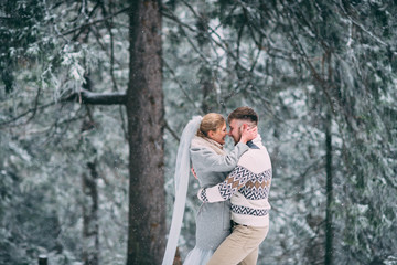 Photo of happy man and woman outdoor in winter