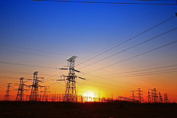 Fototapeta premium Sunset silhouette of pylon