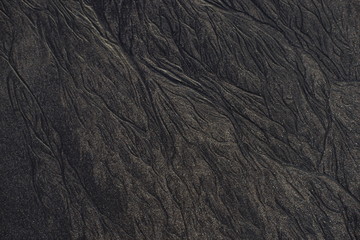 close up of black rough Sandpaper sheet texture use as Background
