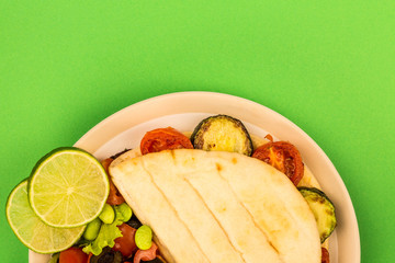 Vegetarian Style Courgette and Cherry Tomato Flatbread With A Fresh Mixed Salad