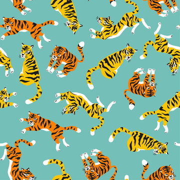 Vector seamless pattern with tigers isolated on the blue background. Animal background for fabric or wallpaper design.