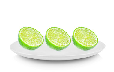 Piece lemon in white plate on white background