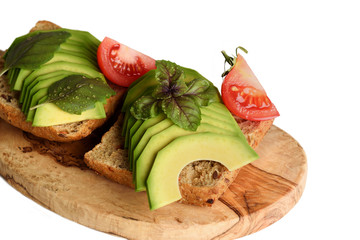 Sandwich with avocado isolated on white - healthy breakfast concept