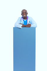Male doctor holding empty placard. Doctor. Billboard