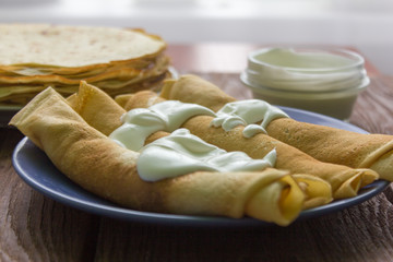 homemade freshly baked pancakes with sour cream