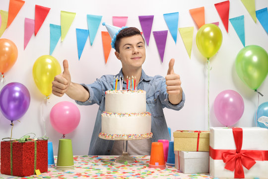 Teenage boy with a birthday cake