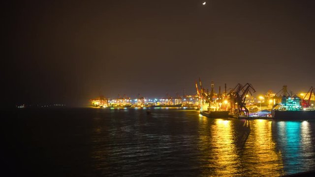 night illuminated shenzhen city working port industrial bay cranes panorama 4k timelapse china
