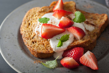 french toasts with yogurt and strawberries for breakfast