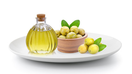 green olives and oil in plate isolated on a white background