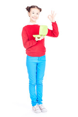 Portrait of cute Asian school girl holding lunch box isolated on white