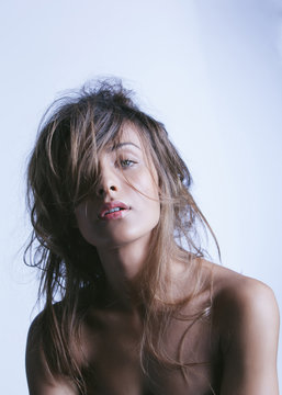 Beauty shot of young woman in studio 