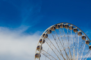 Ferris wheel with blue sky