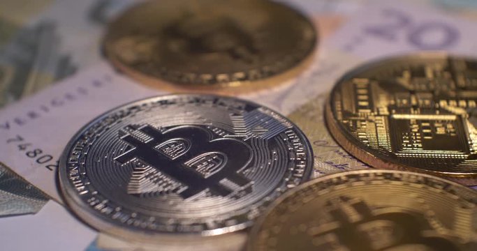 Stack of cryptocurrencies , bitcoin 4K, EUR, silver bitcoin backside