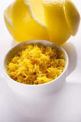 Lemon and juice on a white background
