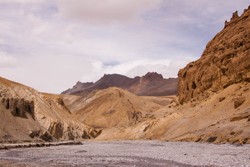Curly road along the river on himalaya highlands in Ladakh. India.Province Jammy and Kashmir.