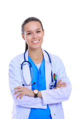 Beautiful young woman in white coat posing with hand in pocket. Woman doctor