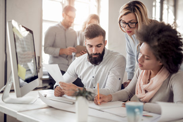 Fototapeta premium Group of architects working together on project.