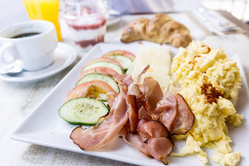 Breakfast ham with Egg on table