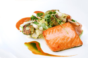 french cuisine dish with tomato and salmon