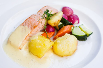french cuisine dish with tomato and salmon