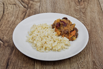 Bean goulash with bulgur on a table