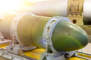 warhead of a nuclear missile indoors. nuclear weapon. a threat.